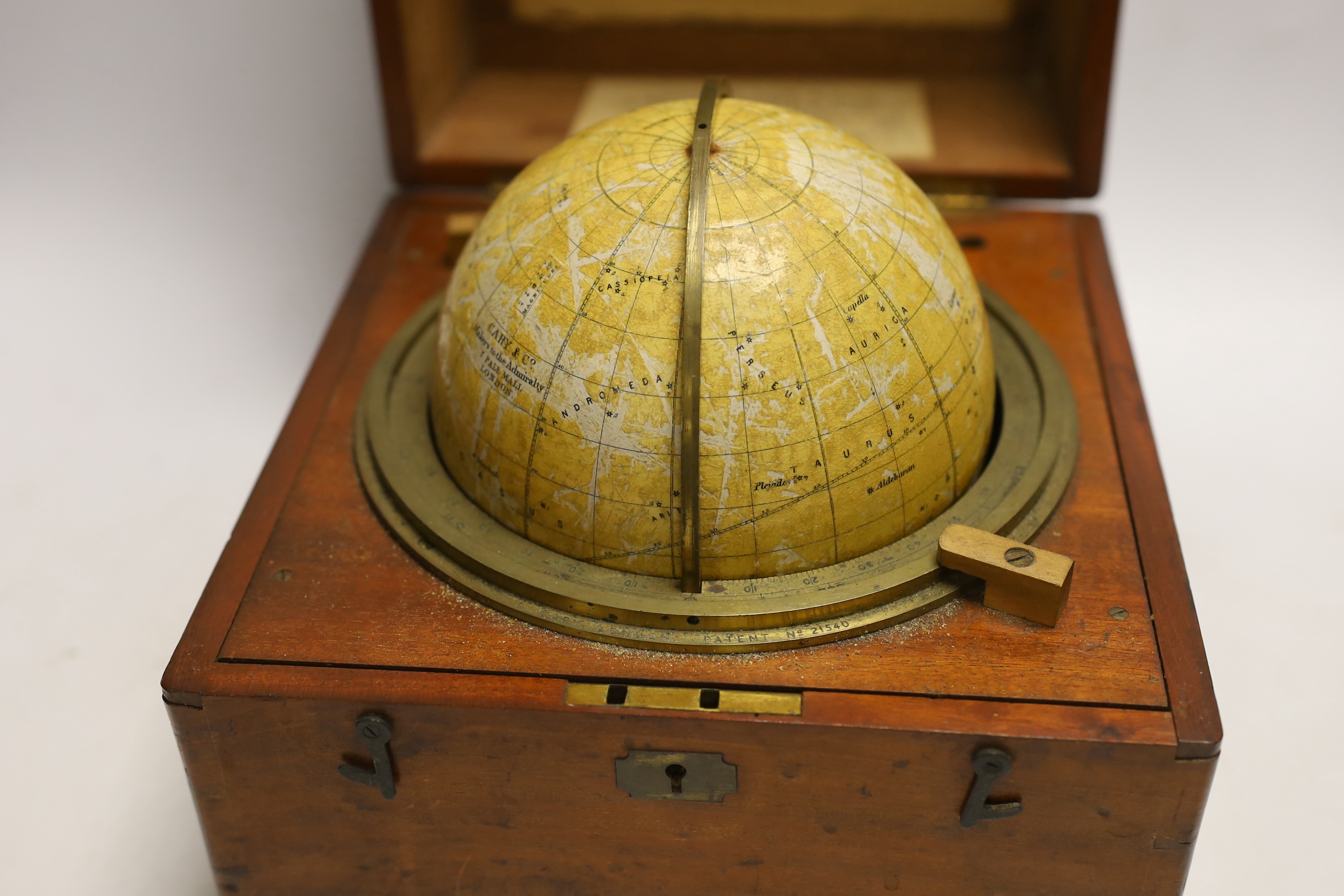 A late 19th century cased astronomical globe by Cary & Co. In mahogany case, globe 14cm